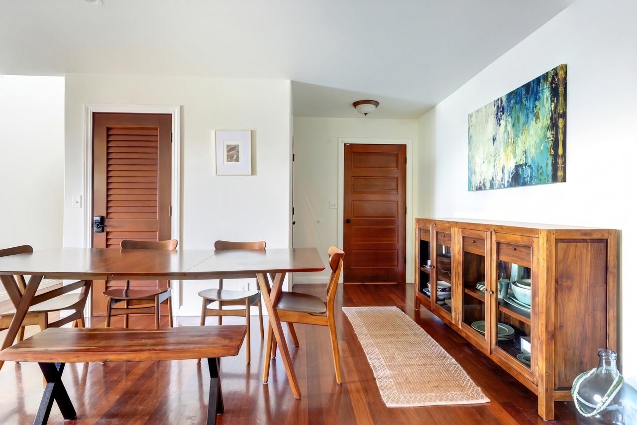 Main House dining area with wooden table and sideboard