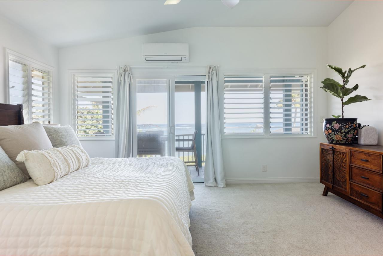Main House bright ocean-view bedroom