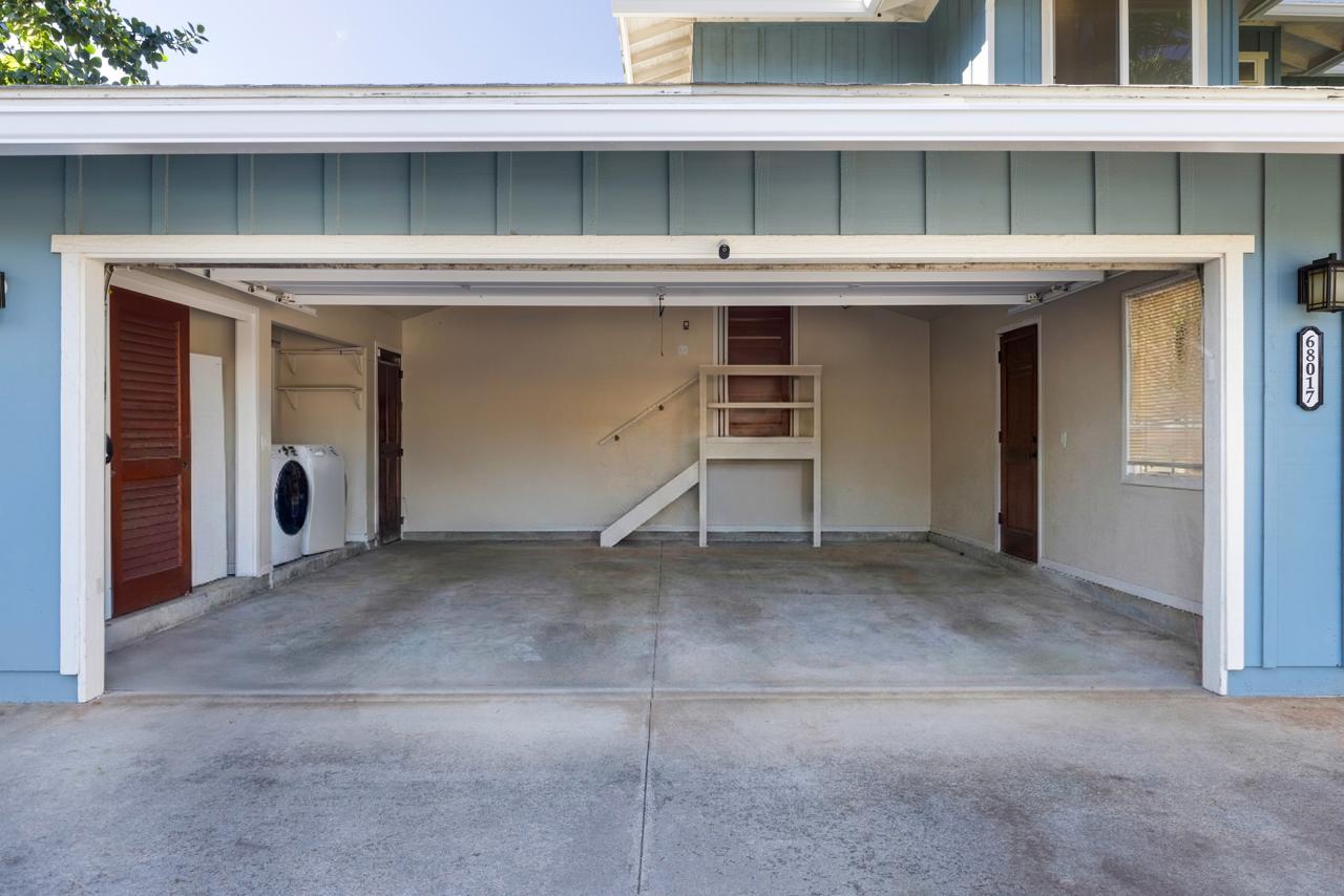Main House open garage and laundry area